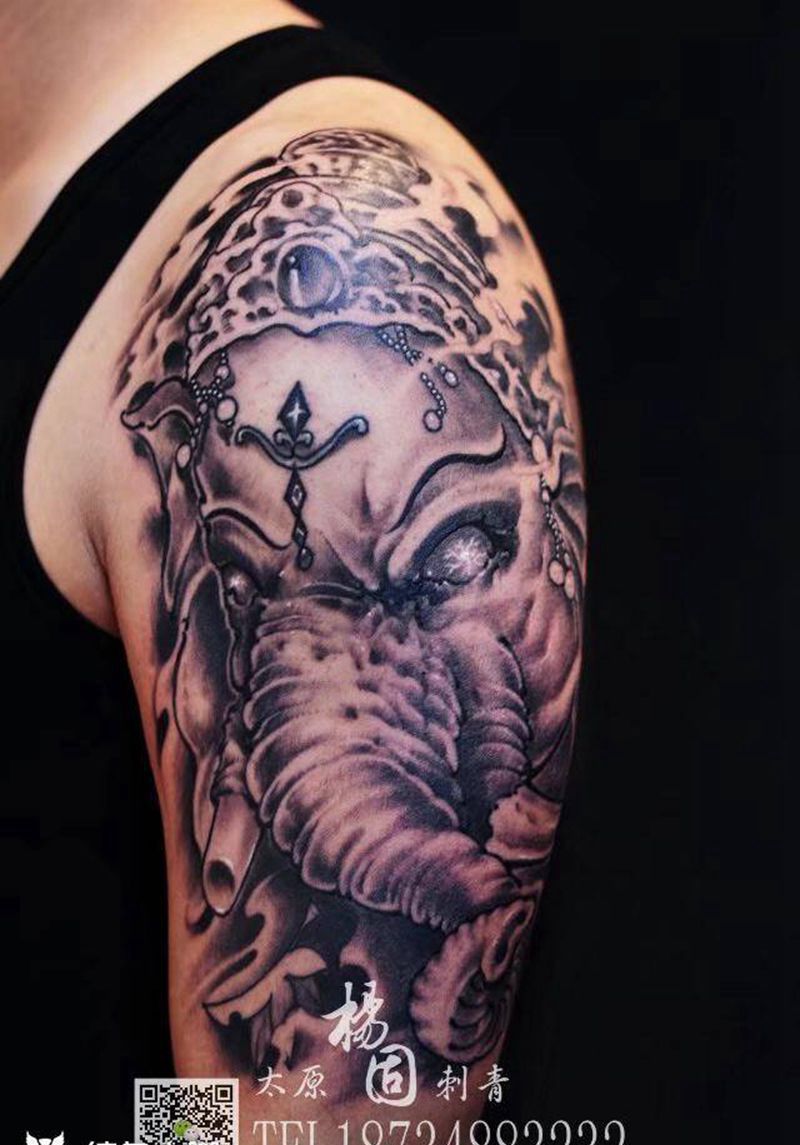 象神纹身图片_成品手臂传统宗教鬼神动物纹身图案