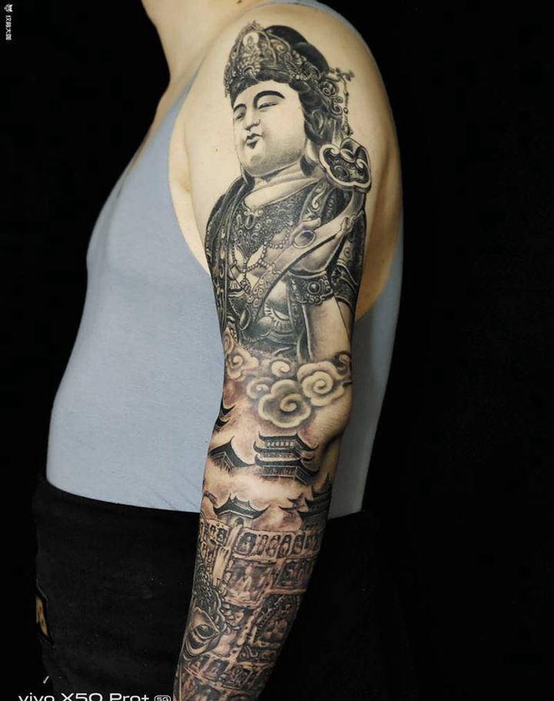 悟空拜佛花臂纹身图片_手臂新传统纹身图案