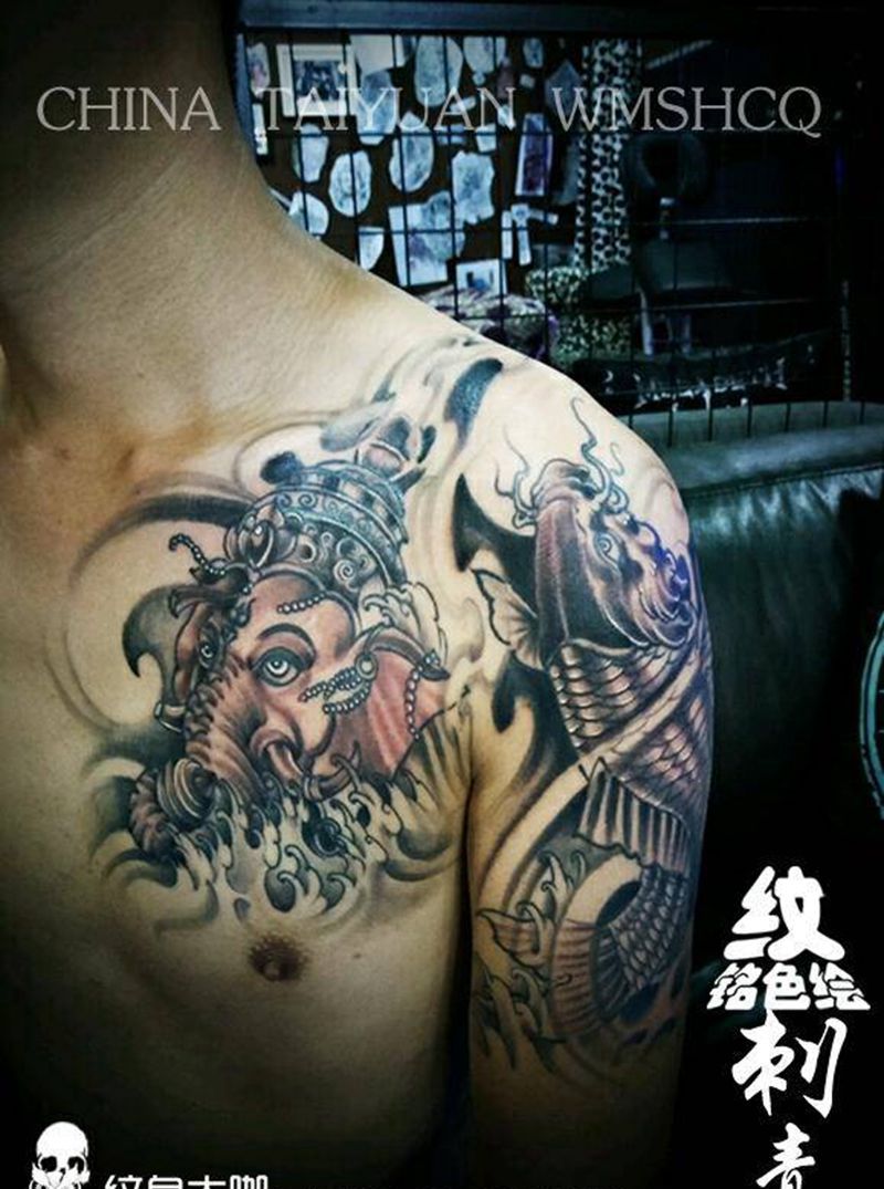 半甲象神纹身图片_胸部纹身图案