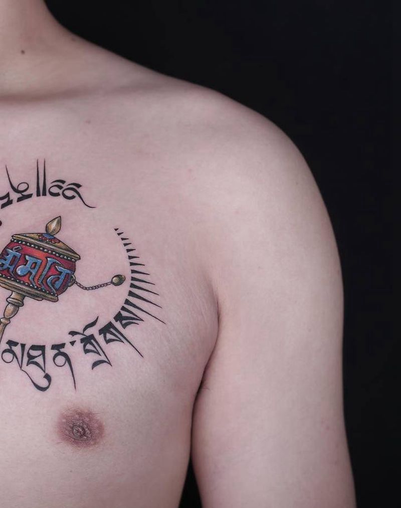 藏文 转经筒纹身图片_胸部肩部欧美写实花体字转经筒彩色写实纹身图案