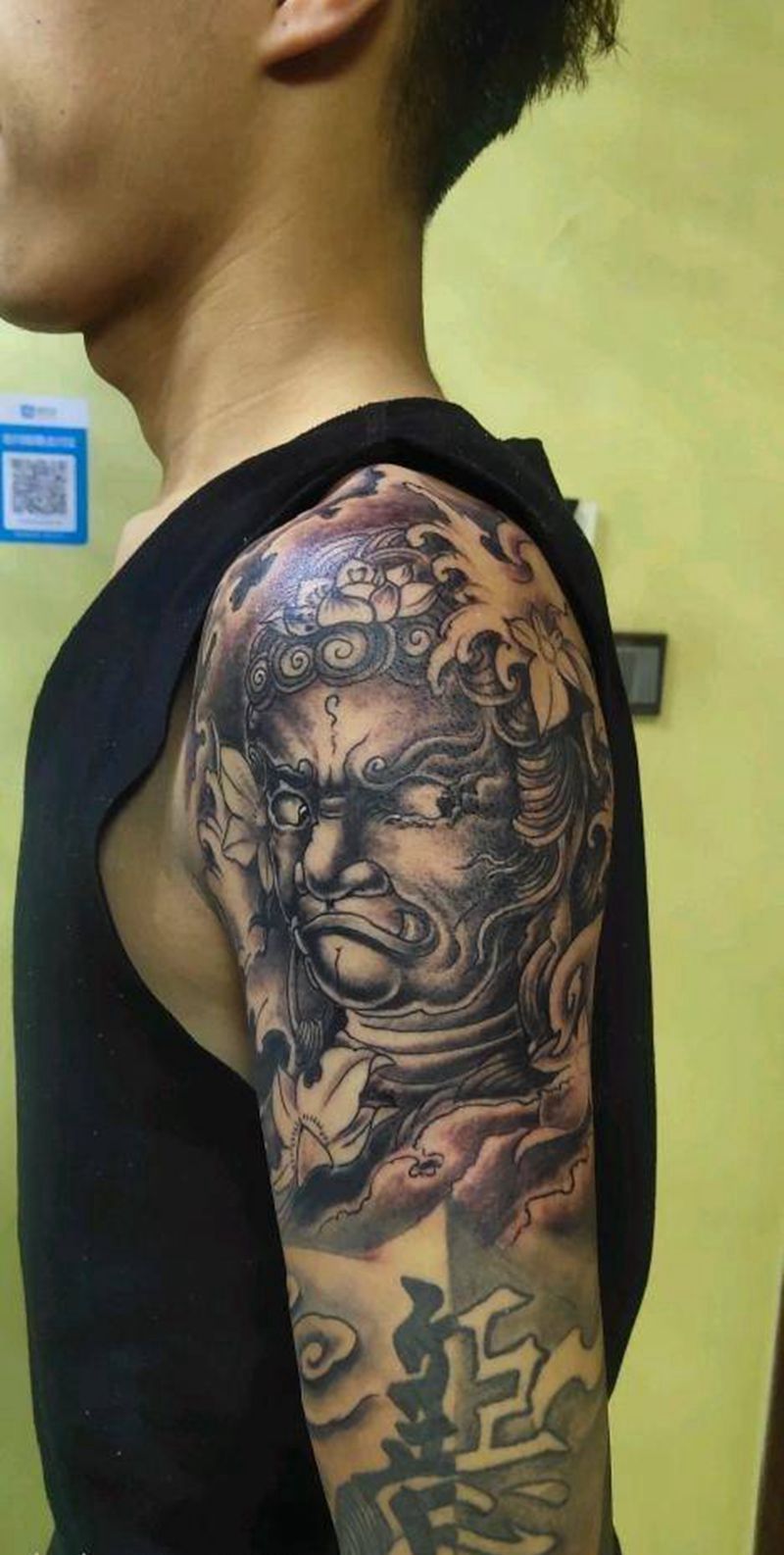 不动明王花臂纹身图片_手臂新传统纹身图案
