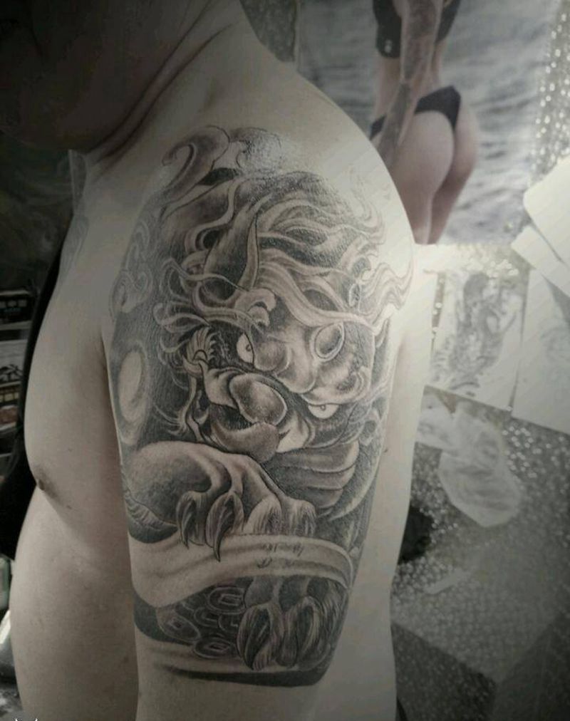 貔貅纹身图片_手臂传统写实动物成品纹身图案