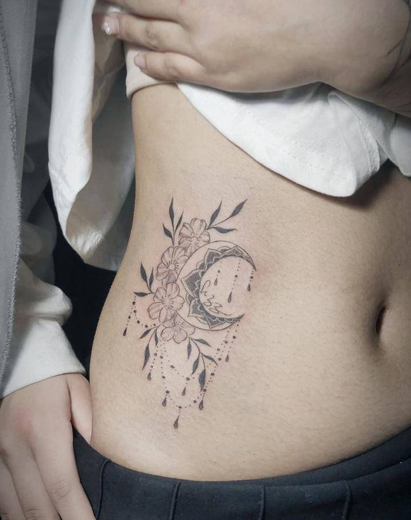 月亮素花纹身图片_腰部腹部点刺素花纹身图案