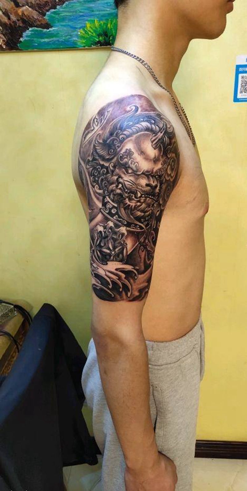 獬豸纹身图片_手臂老传统新传统纹身图案