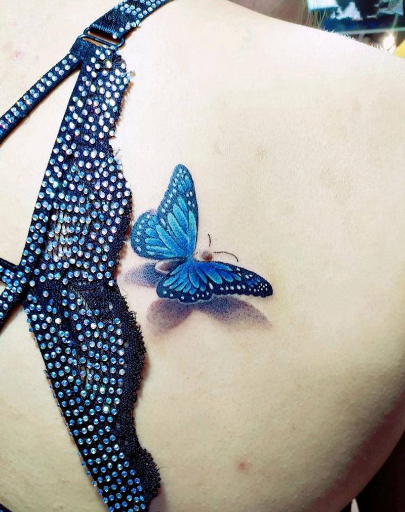 利用黑痣纹蝴蝶纹身图片_背部肩部欧美写实新传统纹身图案