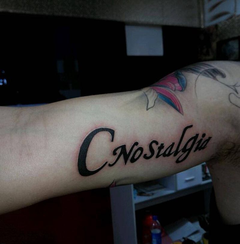 花体英文  留恋纹身图片_手臂清新字符成品纹身图案