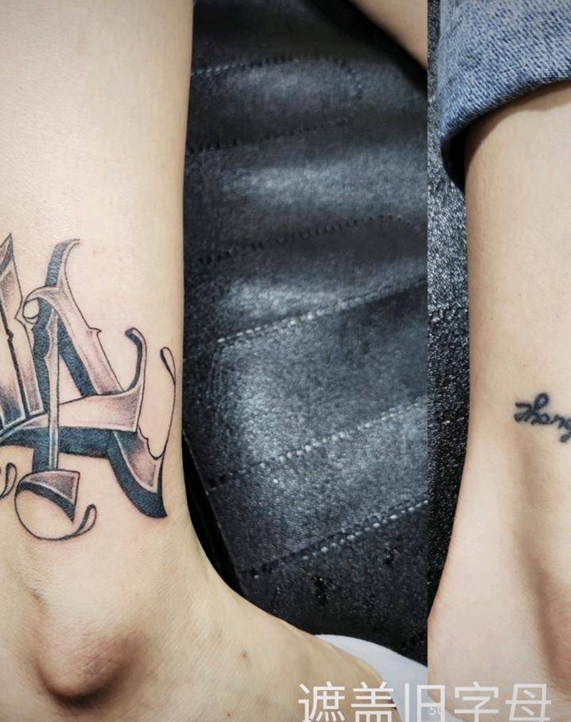 遮盖旧字母纹身图片_腿部花体字纹身图案