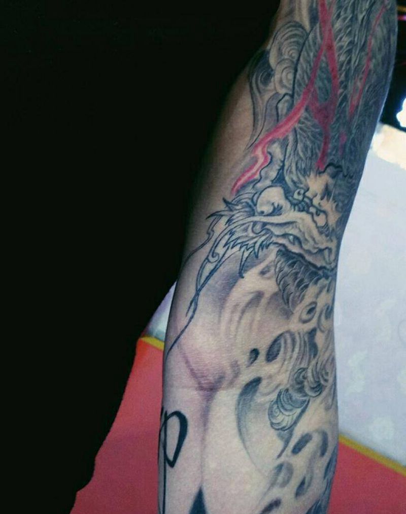 麒麟臂纹身图片_手臂传统动物成品纹身图案