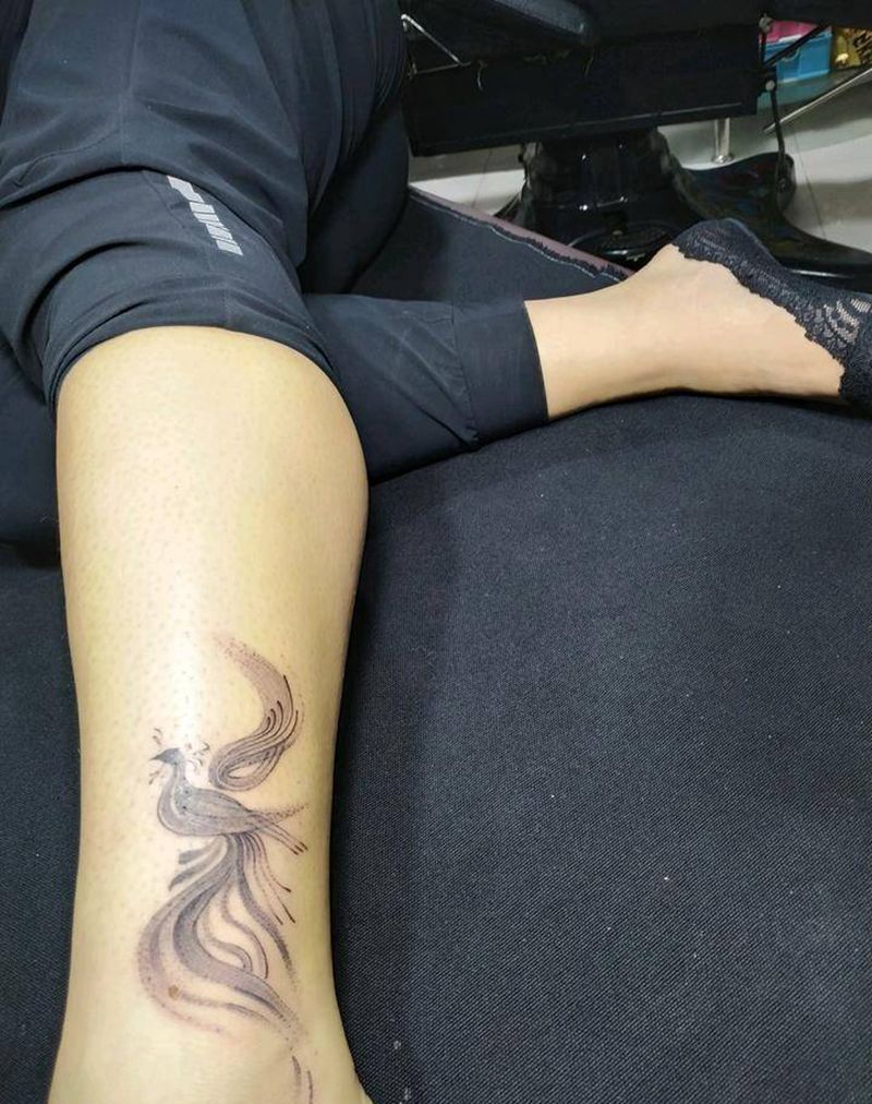点刺凤凰图腾纹身图片_腿部图腾点刺纹身图案