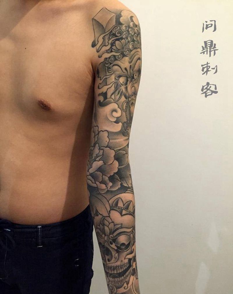 不动明王花臂纹身图片