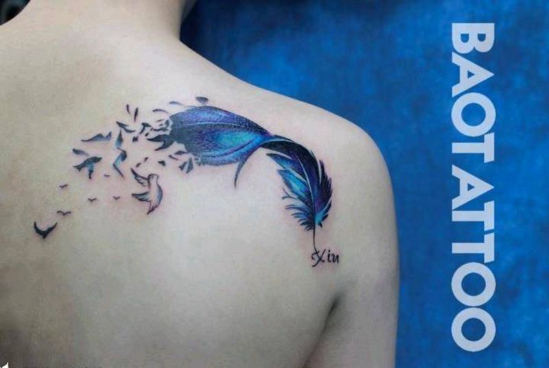 羽毛纹身图片_背部成品纹身图案