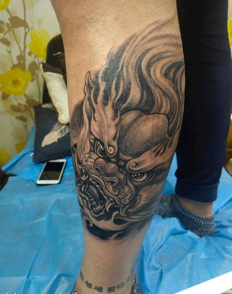 唐狮纹身图片_腿部老传统新传统纹身图案