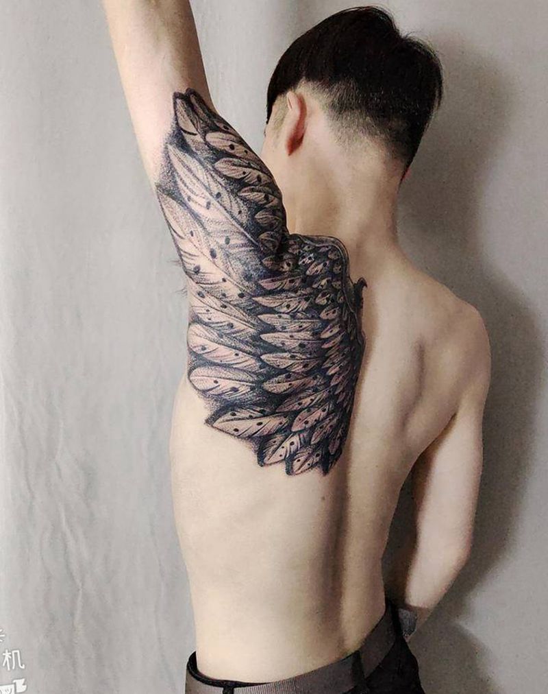 翅膀纹身图片_手臂肩部新传统点刺纹身图案
