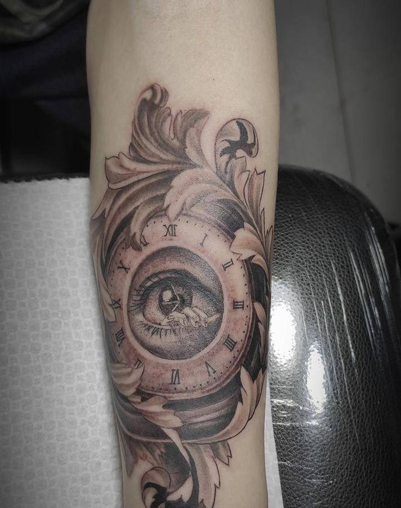 唐草时钟纹身图片_手臂欧美写实点刺时钟唐草眼睛纹身图案