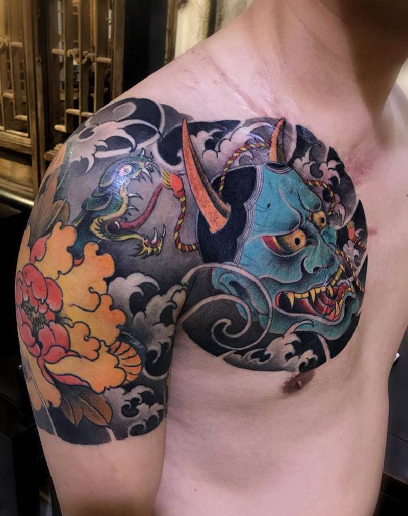 般若半甲遮盖疤痕纹身图片_胸部新传统纹身图案