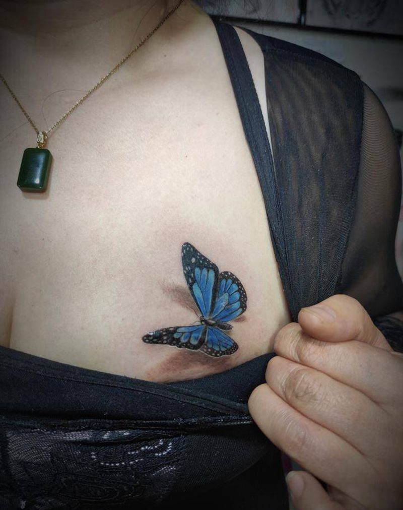 蝴蝶遮盖疤痕纹身图片_胸部欧美写实遮盖疤痕纹身图案