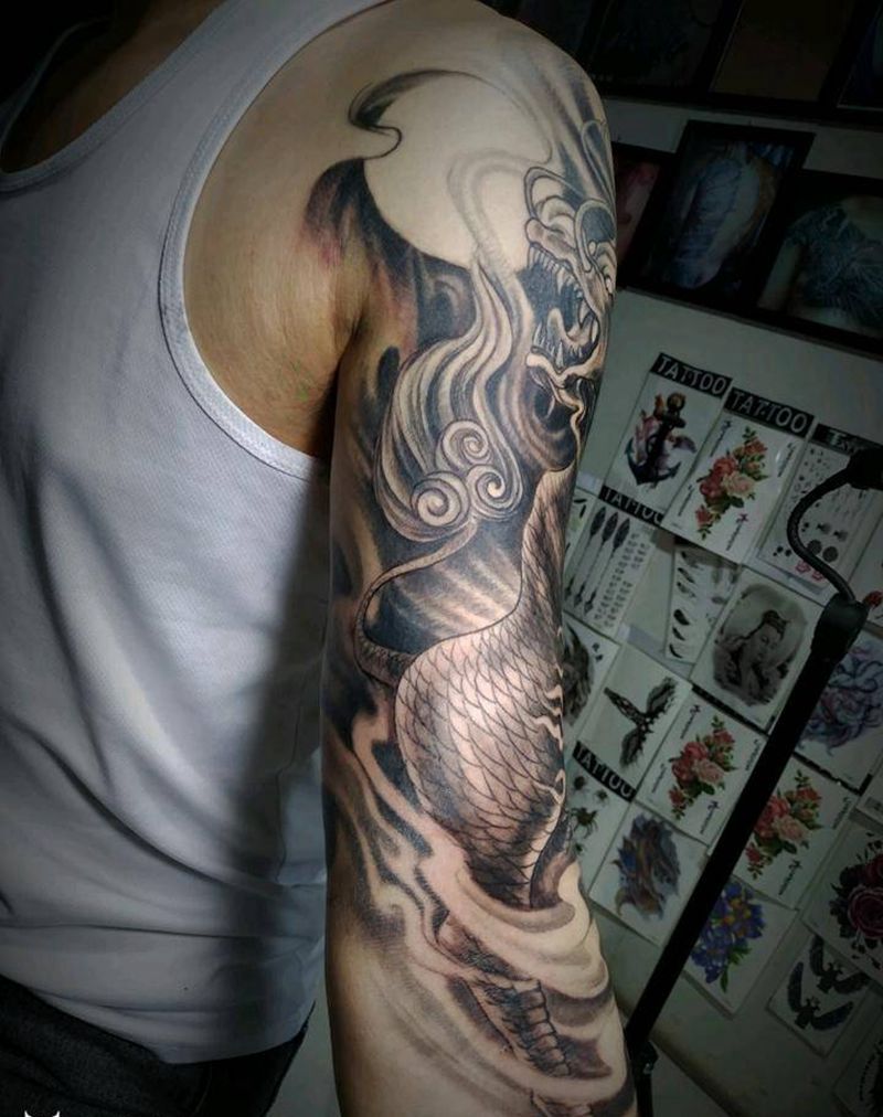 麒麟臂纹身图片_手臂新传统七分袖纹身图案