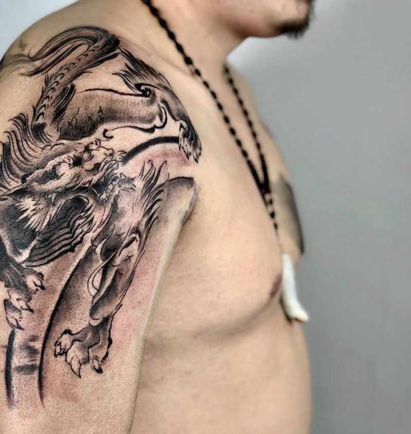 麒麟纹身图片_手臂水墨纹身图案