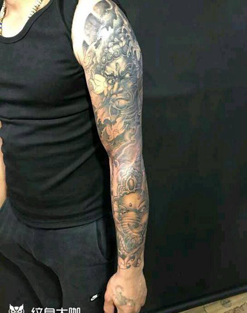 不动明王花臂纹身图片_肩部手臂手部传统习俗动物鬼神宗教成品手稿纹身图案