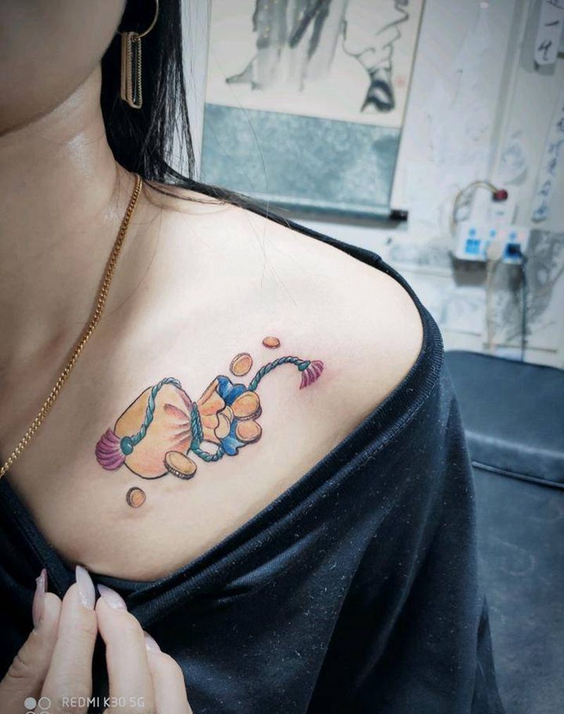 钱袋子纹身图片_胸部New School纹身图案