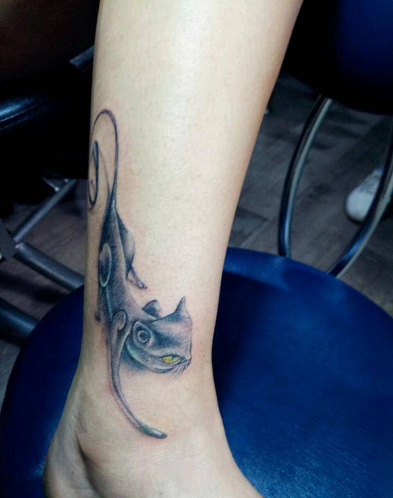 小野猫纹身图片_腿部清新动物成品纹身图案
