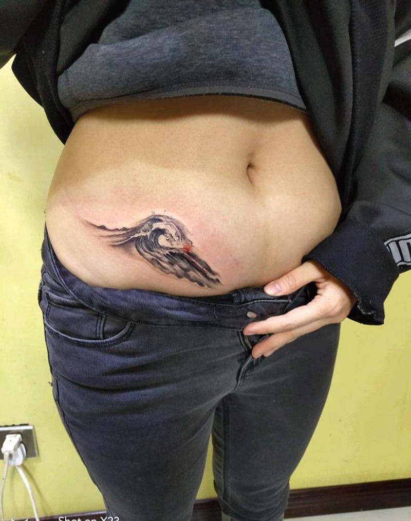 情侣纹身浪花纹身图片_腹部手臂新传统纹身图案