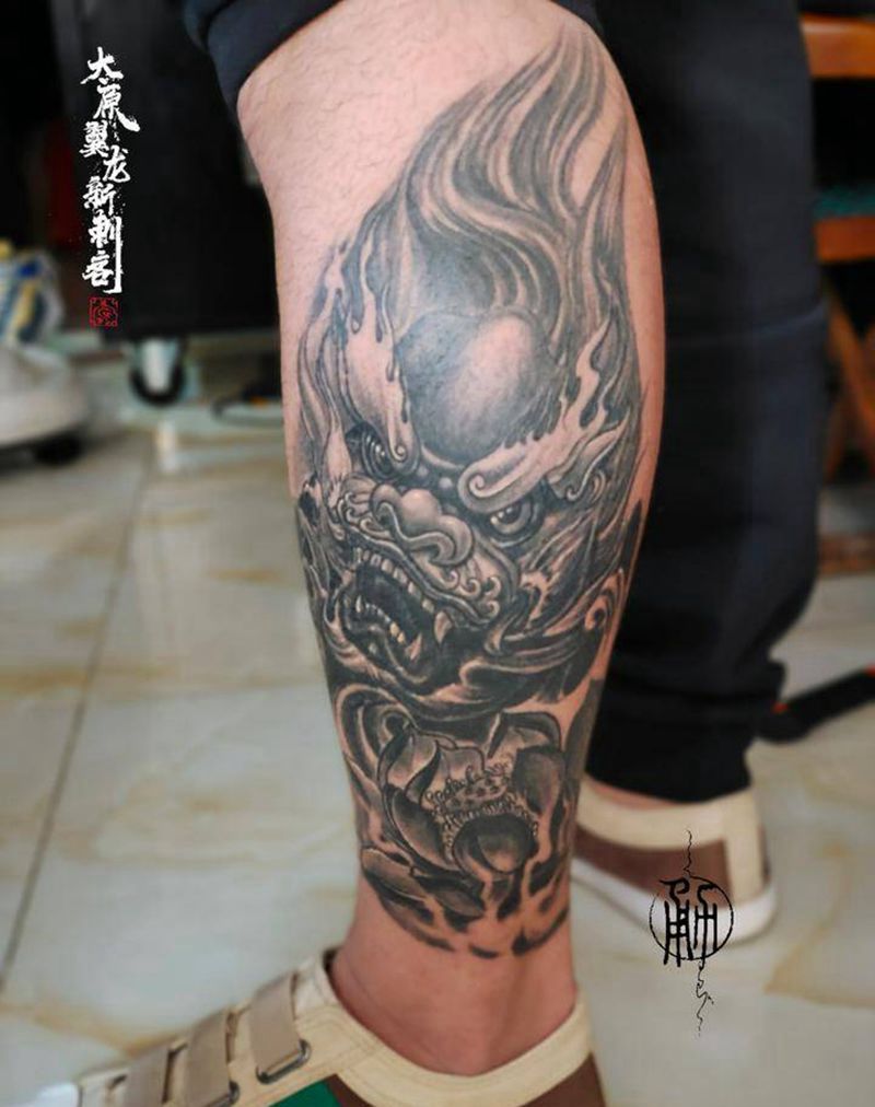 唐狮纹身图片_腿部新传统纹身图案