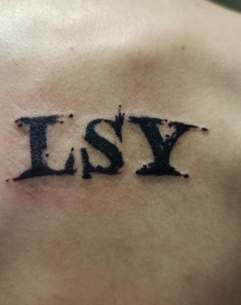 英文字母设计纹身图片_背部花体字纹身图案