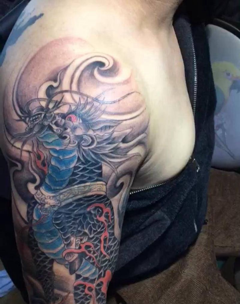 盖图麒麟纹身图片_新传统纹身图案