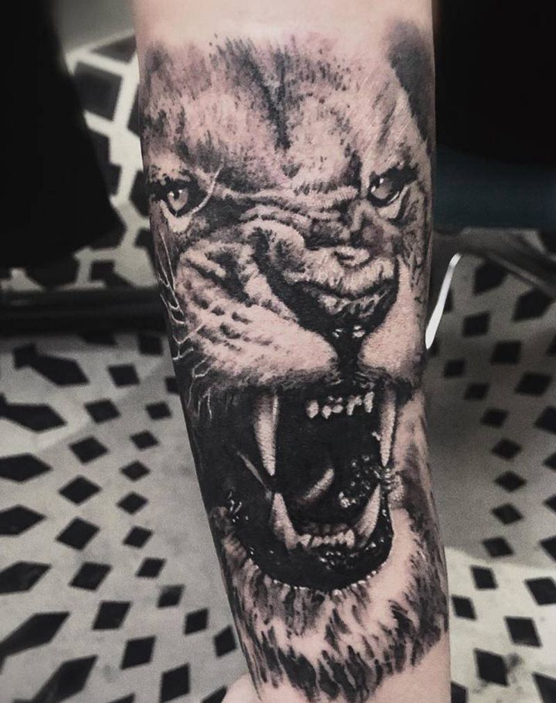 狮子纹身图片_手臂欧美写实狮子纹身图案