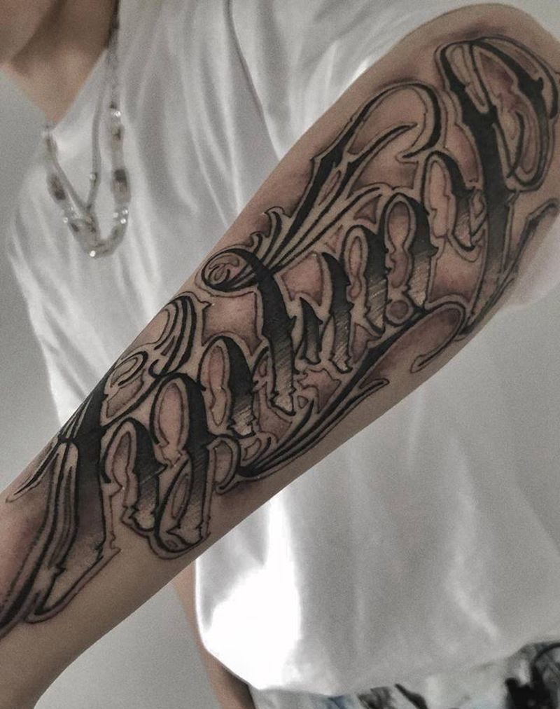 奇卡诺纹身图片_手臂花体字纹身图案