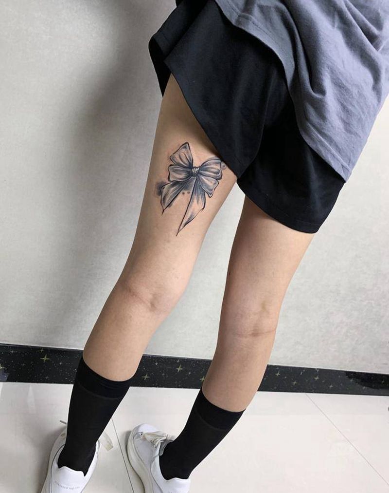 蝴蝶结纹身图片_腿部新传统纹身图案