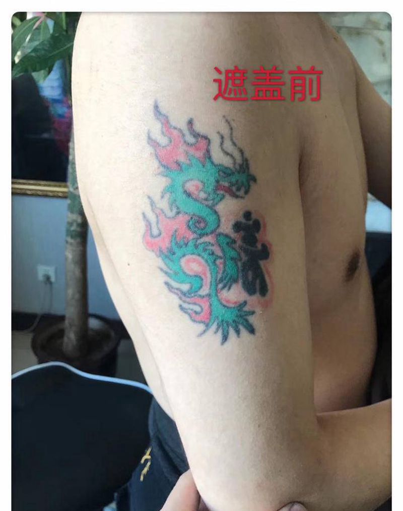 遮盖，半甲， 象神纹身图片_手臂肩部新传统纹身图案