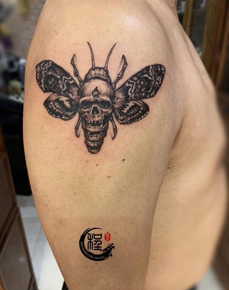 蝶变纹身图片_手臂欧美写实纹身图案