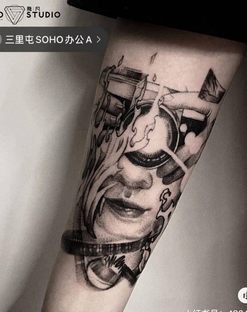 相机女纹身图片_手臂纹身图案