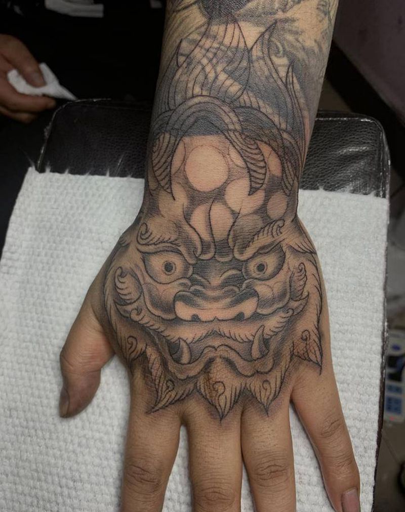 手绘唐狮纹身图片_新传统纹身图案