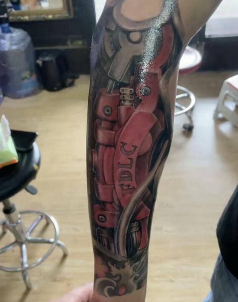 机械臂纹身图片_手臂纹身图案