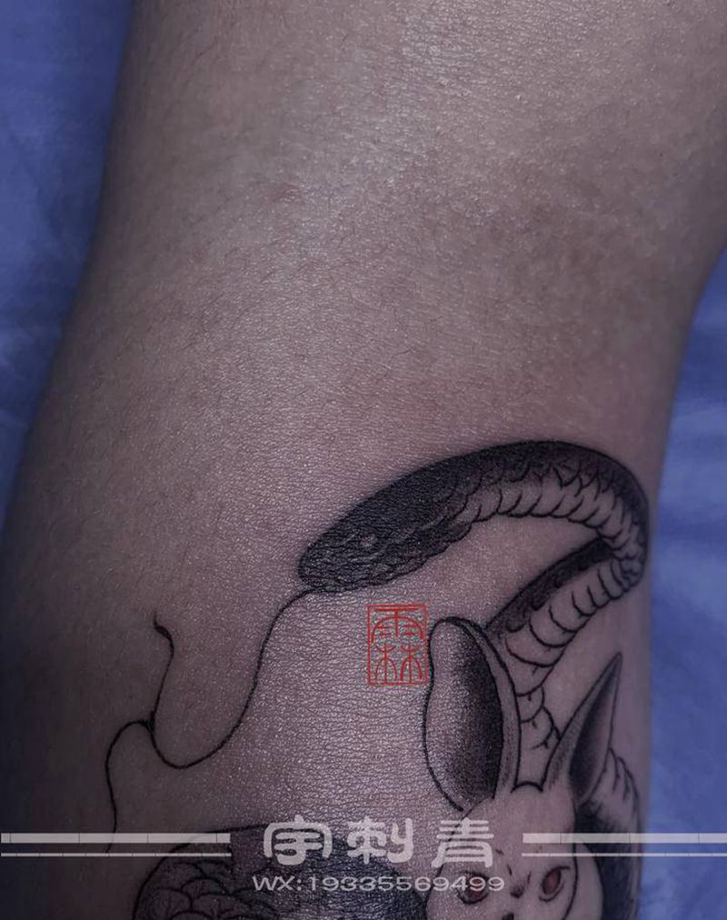 情侣生肖纹身图片_手臂纹身图案