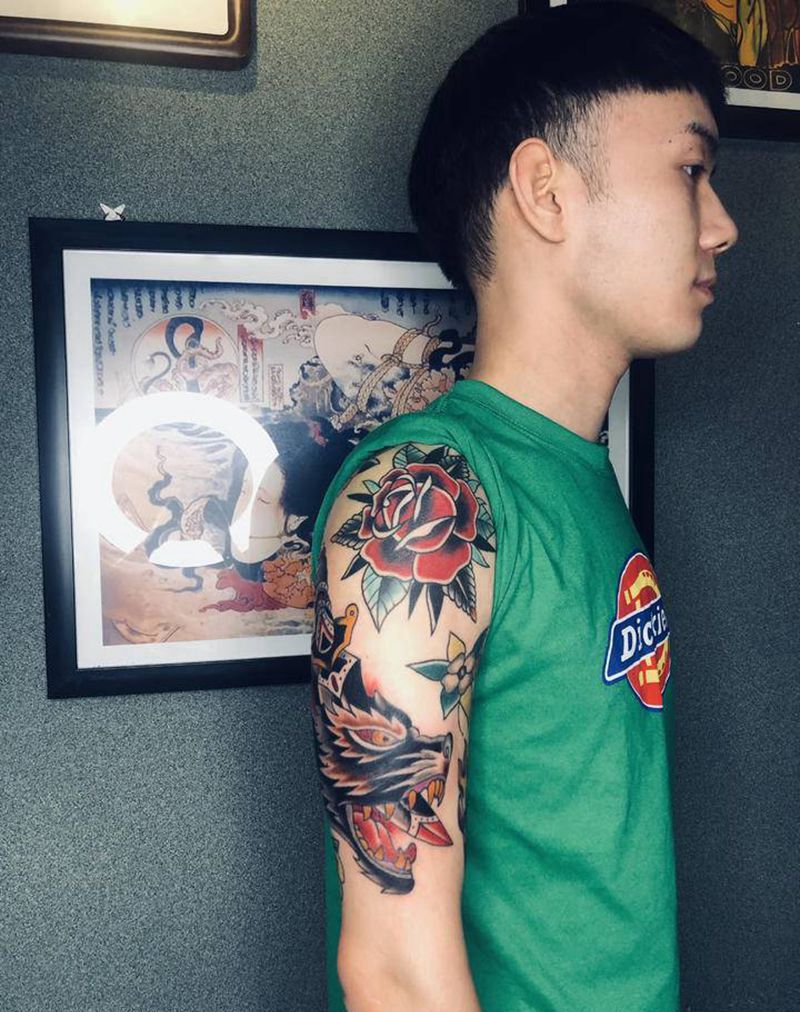 拼接大臂恢复后效果纹身图片_手臂Old School纹身图案