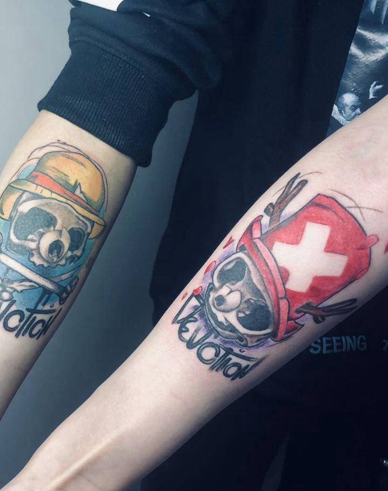 情侣纹身纹身图片_手臂卡漫纹身图案