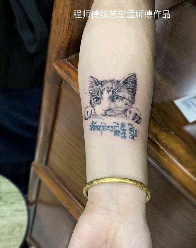 猫咪纹身图片_手臂欧美写实纹身图案