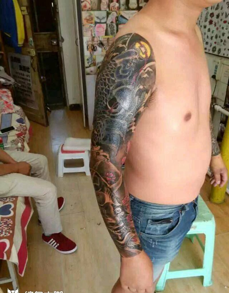 花臂遮盖纹身图片