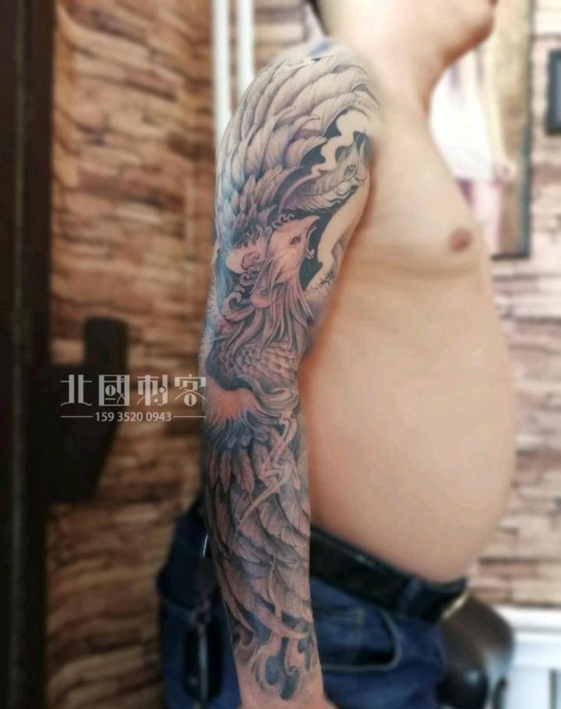 凤臂纹身图片_肩部手臂老传统新传统凤凰花臂凤凰花臂纹身图案