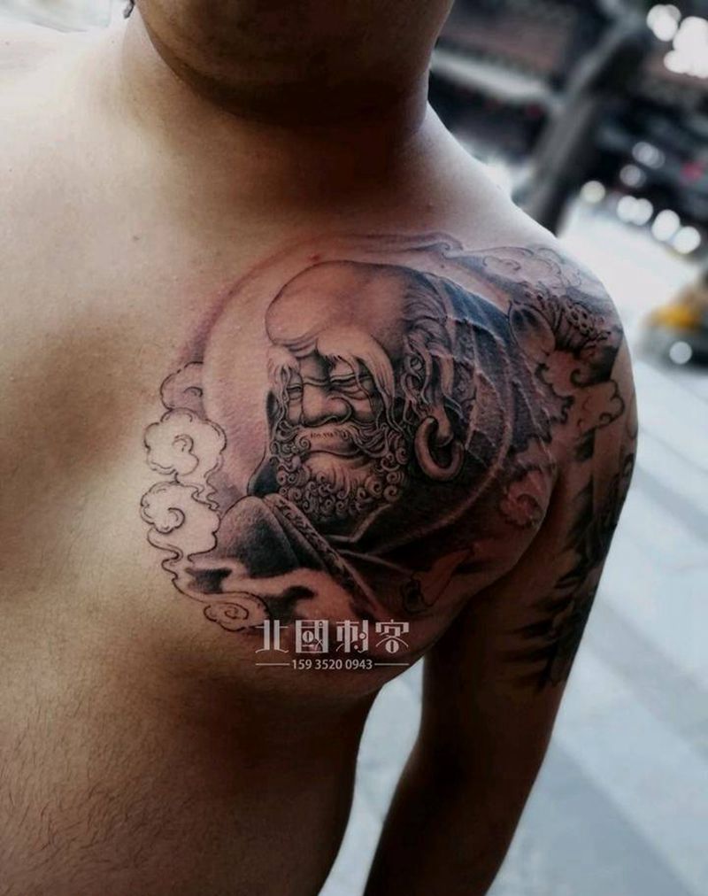 达摩纹身图片_胸部肩部新传统老传统达摩纹身图案