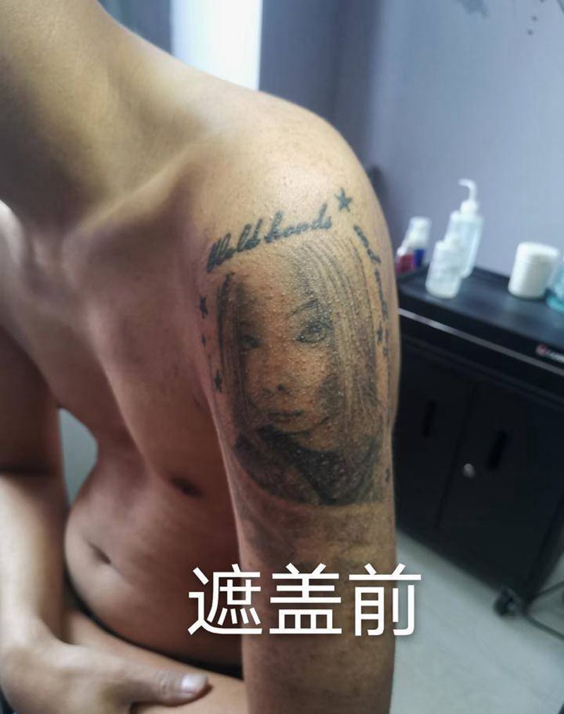 遮盖毁皮纹身纹身图片_肩部手臂新传统鱼浪花遮盖纹身图案