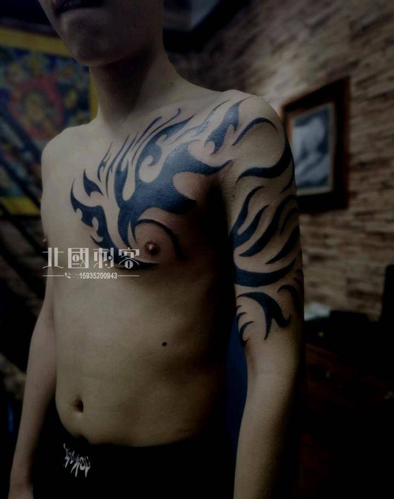 图腾纹身图片_手臂胸部图腾几何纹身图案