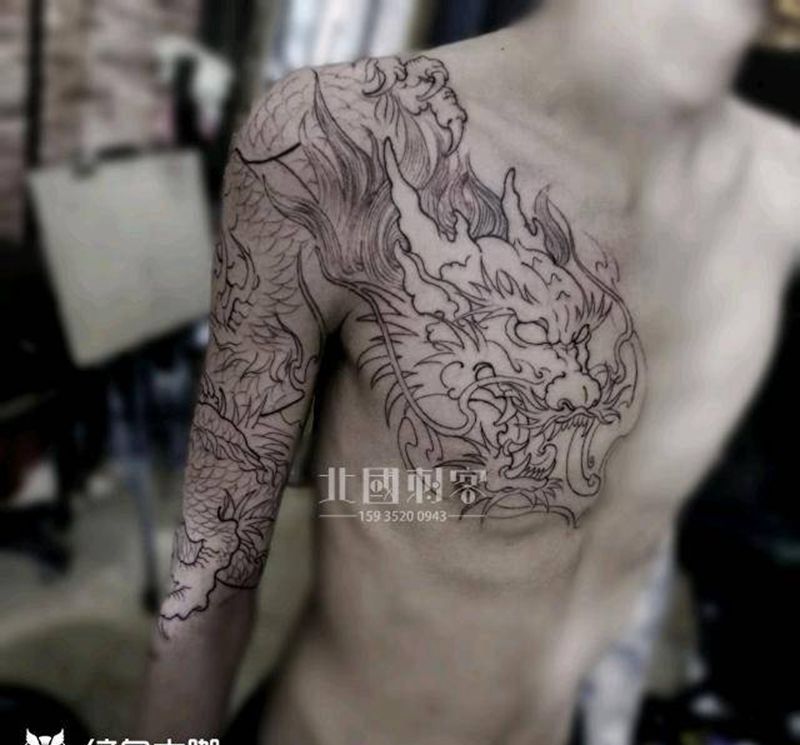 传统龙线条纹身图片_手臂胸部新传统老传统过肩龙龙线条传统龙纹身图案