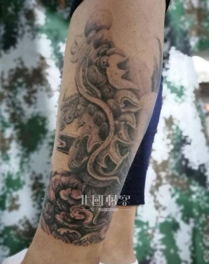 石雕龙包小腿纹身图片_腿部新传统老传统纹身图案