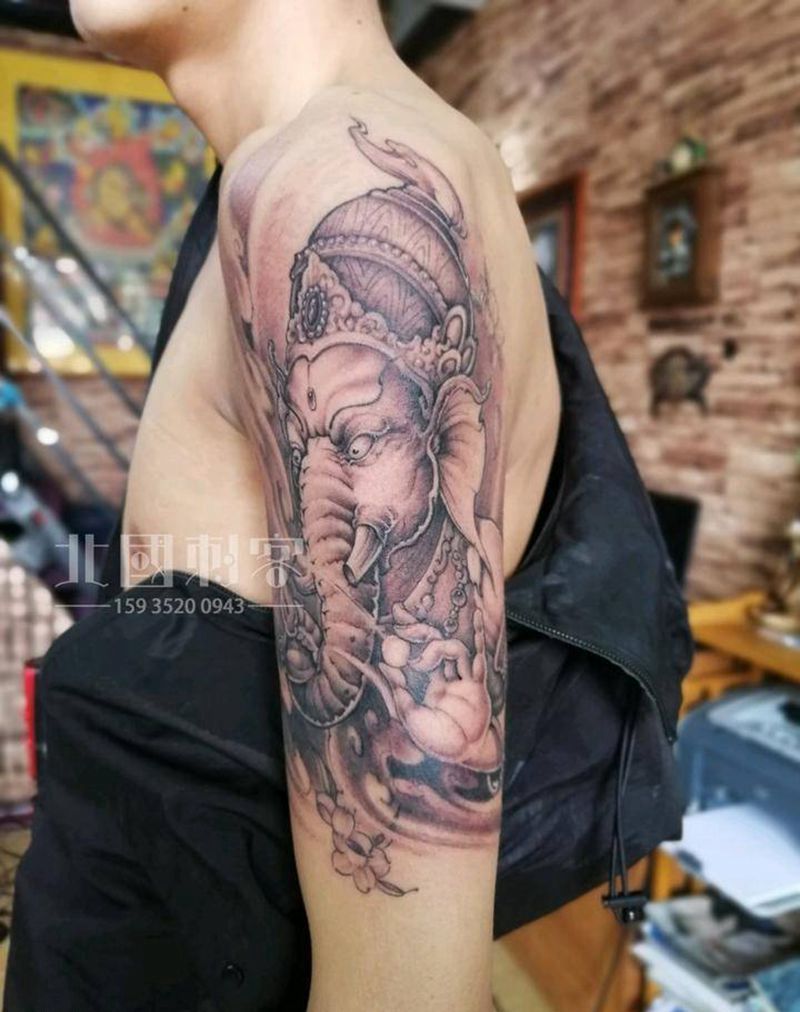 象神纹身图片_手臂手部新传统老传统象神大臂纹身大臂象神纹身图案