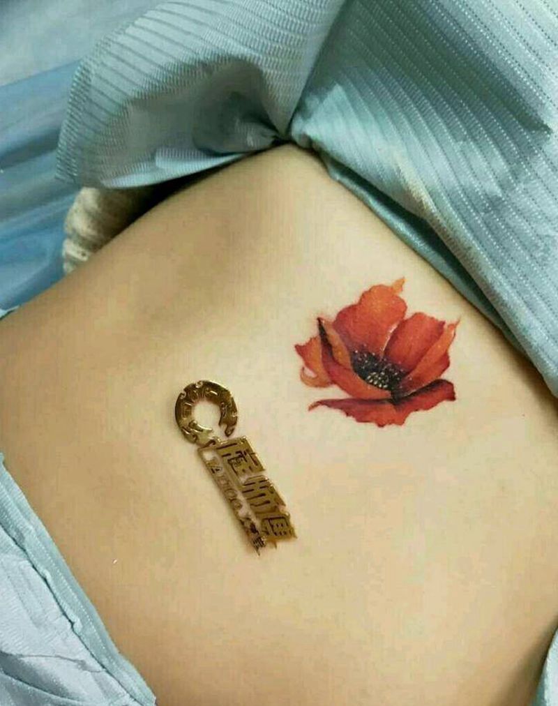 遮疤作品纹身图片_腹部纹身图案